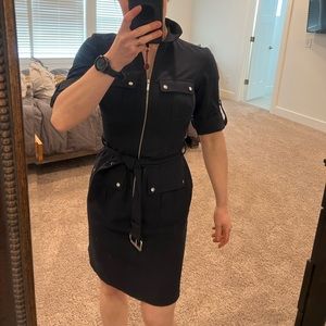 Marc Jacob’s structured collared dress with belted waist